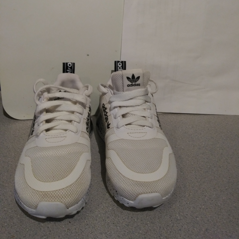 Boys used Adidas tennis shoes